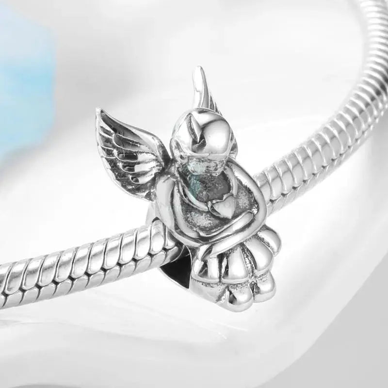 Angel and Virgin Mary Charms - Uniquely You Online