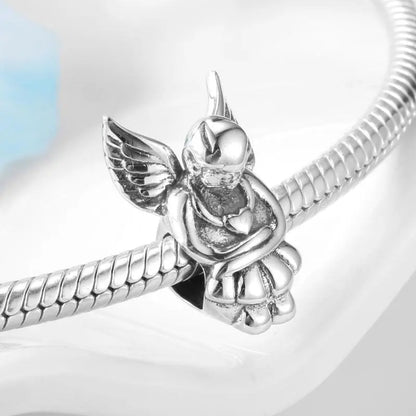 Angel and Virgin Mary Charms - Uniquely You Online