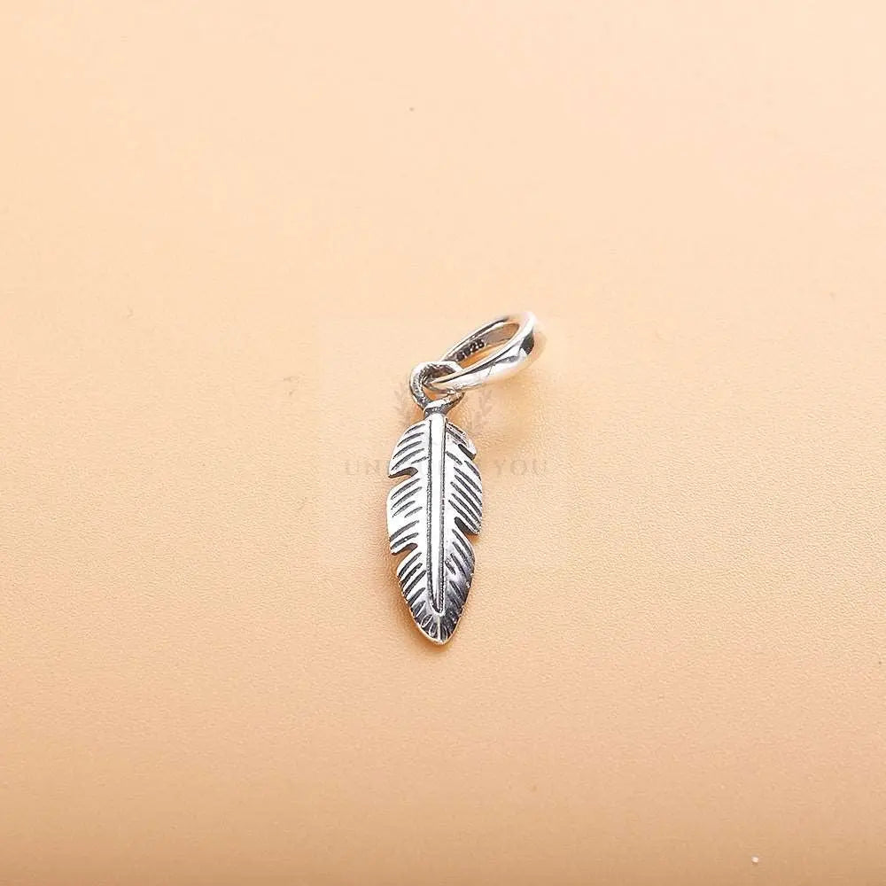 Antique Feather Charm