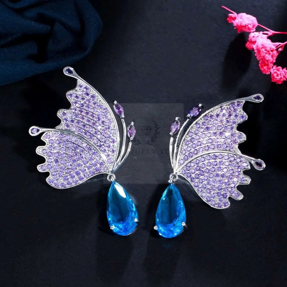 Pendientes de ala de mariposa púrpura/azul