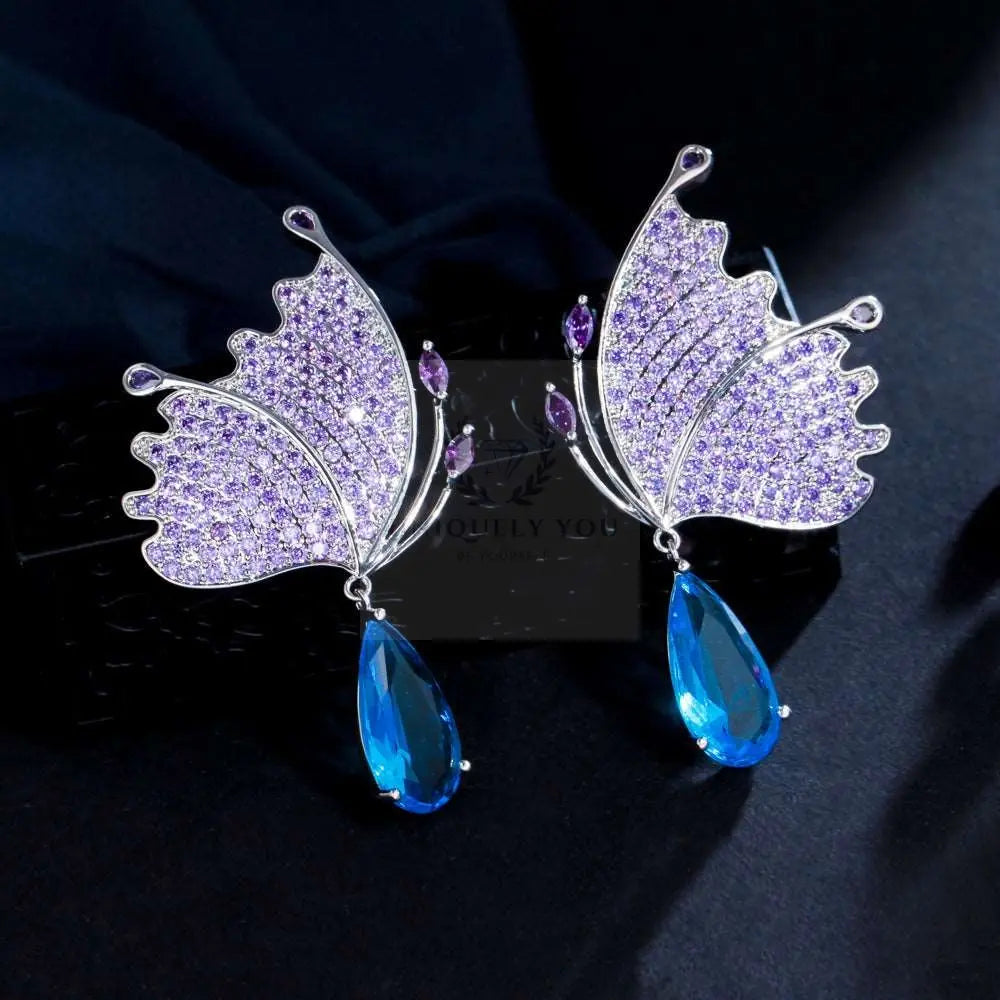 Pendientes de ala de mariposa púrpura/azul