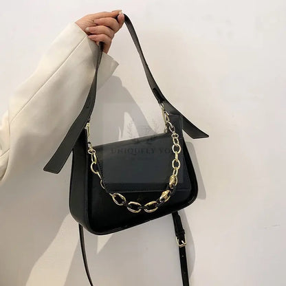 Bolso con cadena geométrica