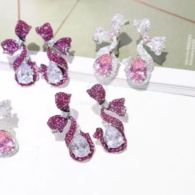 Pink/Silver Butterfly Bow Earrings