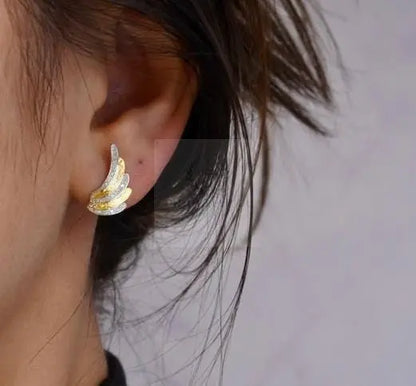 Aretes de ala de dos tonos